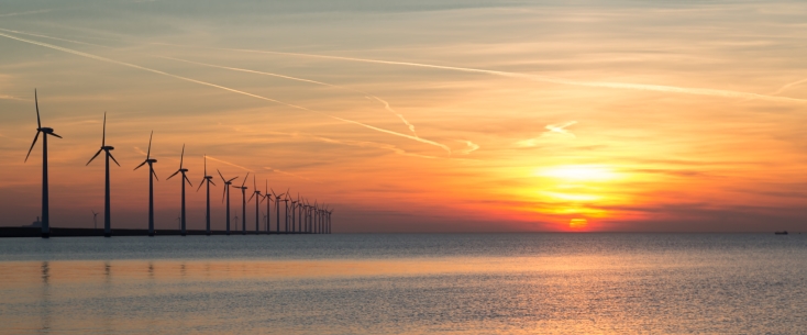 Offshore wind turbines during a beautiful sunset